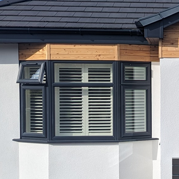 Anthracite Grey UPVC Bay Window on Modern House