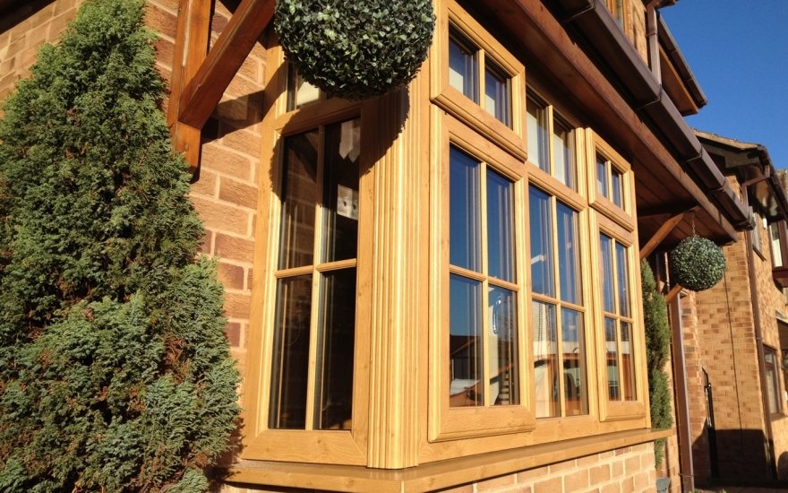 Golden Oak UPVC Bay Window on Modern Villa