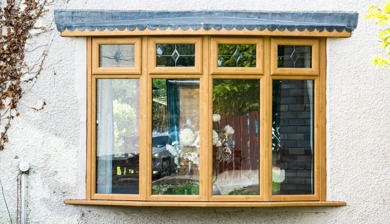 Professional Golden Oak UPVC Bay Window Installation