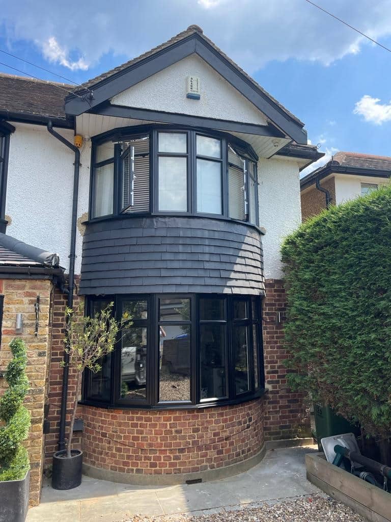 Modern House with Black UPVC Bay Windows Exterior