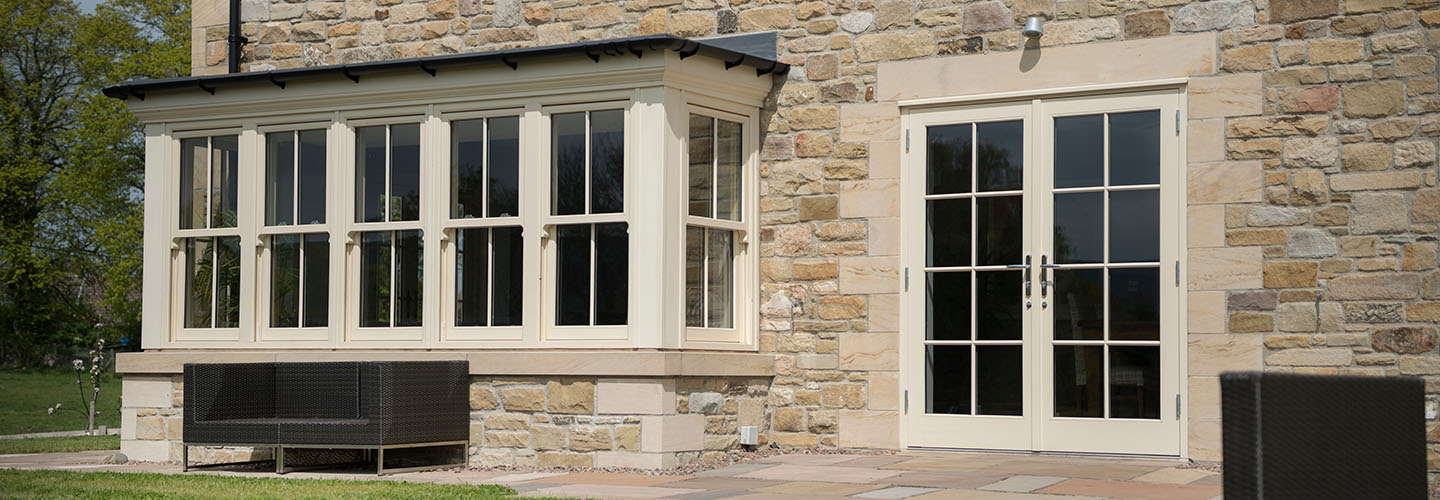 Professional UPVC Bay Window Installation with Stone Exterior